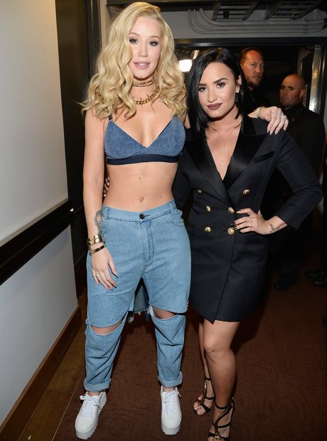 Iggy Azalea with Demi Lovato backstage at iheartra