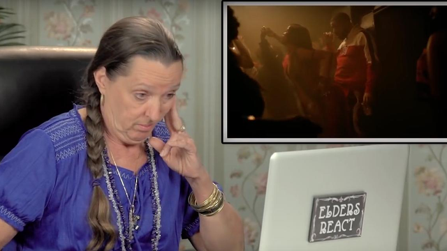 Woman reacting to Rihanna Work video