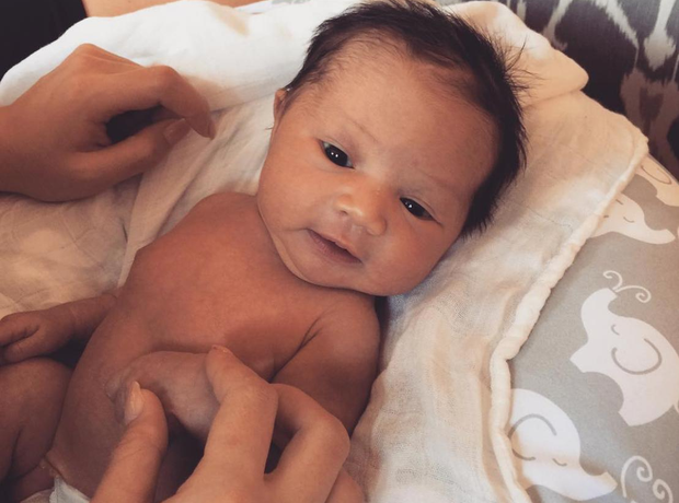 John Legend shares new photo of his new baby girl