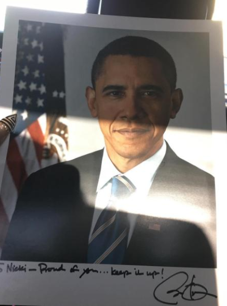 Nicki Minaj holding picture of Obama