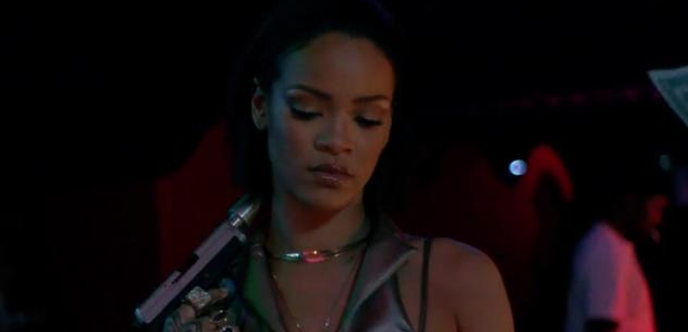 Rihanna holding gun