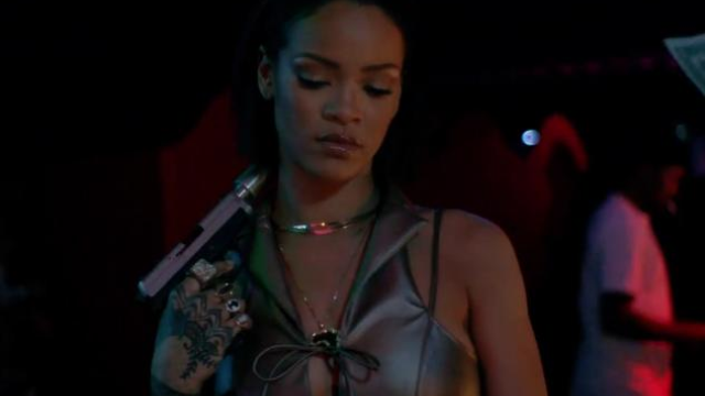 Rihanna holding gun