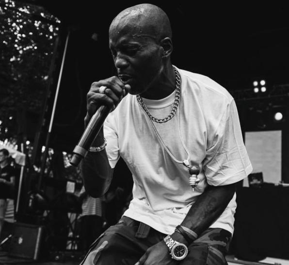 DMX holding a microphone