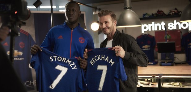 Stormzy and David Beckham holding football shirts