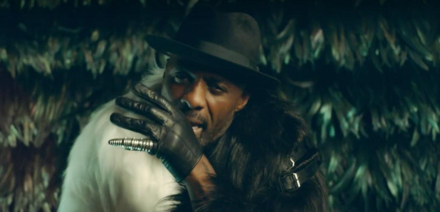 Idris Elba wearing fur coat