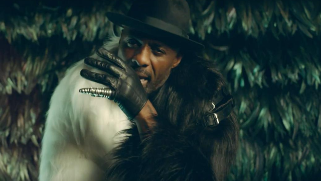 Idris Elba wearing fur coat