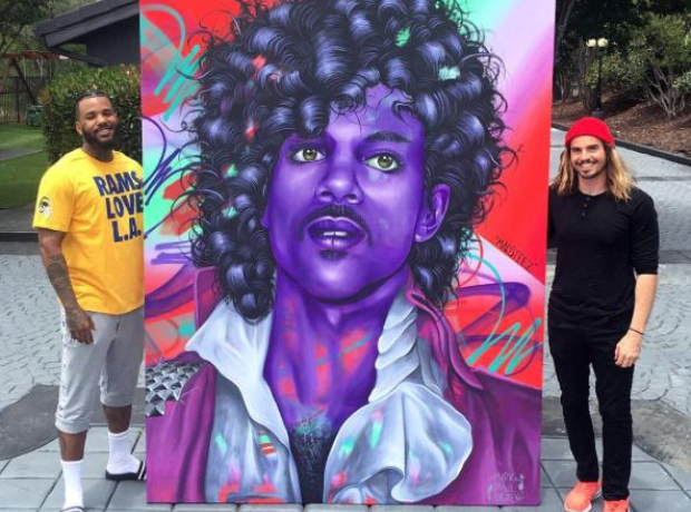 The Game stood with Prince portrait