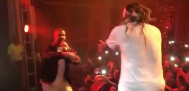 Drake and Future performing on stage