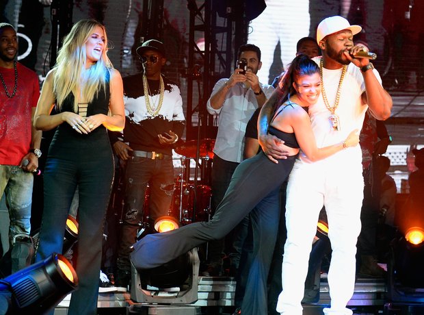 Khloe and Kourtney Kardashian join 50 Cent live on