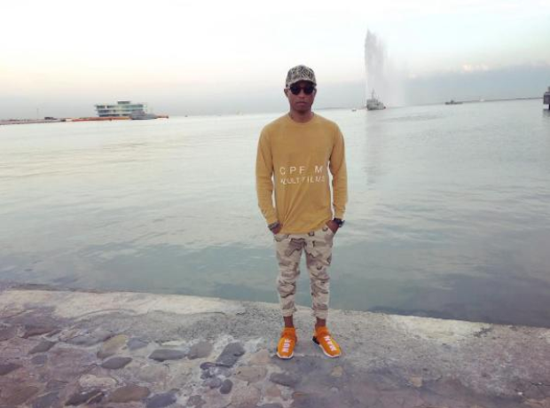 Pharrell in front on pool