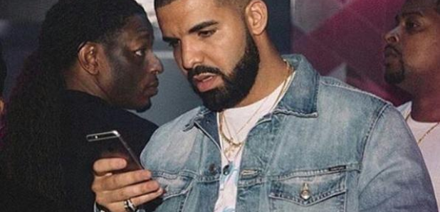 Drake Looking At Phone