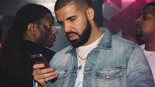 Drake Looking At Phone
