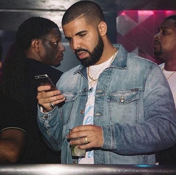 Drake Looking At Phone