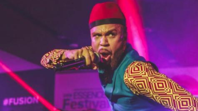 Jidenna performing on stage
