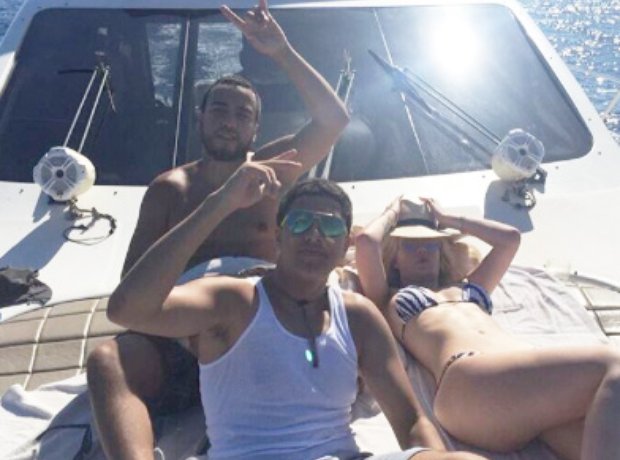 Iggy Azalea and French Montana on a yacht