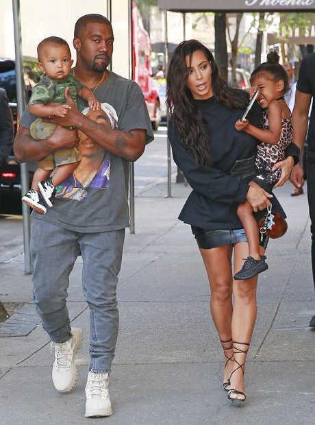 Kanye West with Kim and children Saint and North