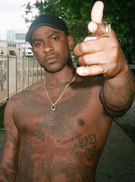 Skepta wearing no shirt