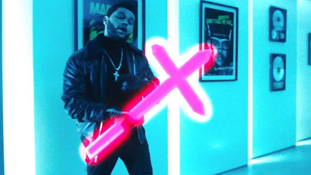 The Weeknd holding a cross in his Starboy Video