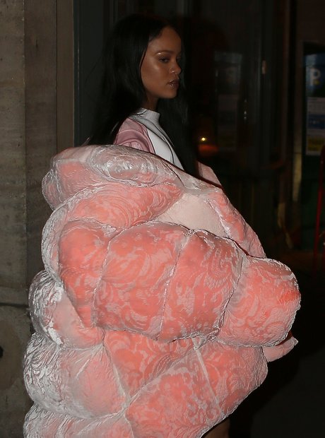 Rihanna wears a bold pink coat in Paris