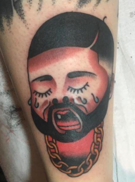 This cartoon-style tatt involves a crying baby Drake (obvs ...