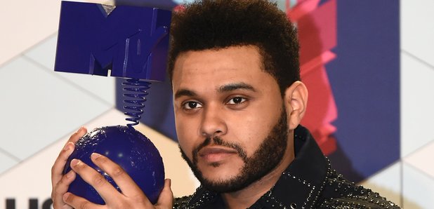 The Weeknd holding MTV EMA Award