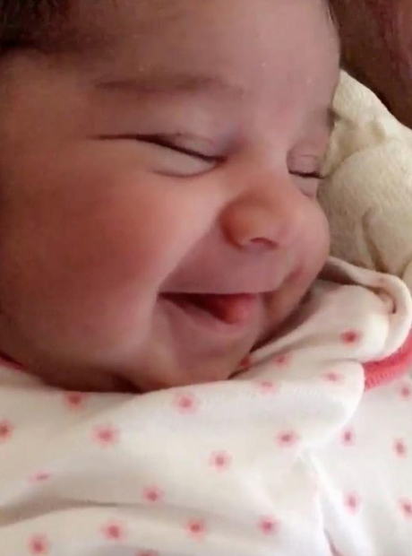 Dream Kardashian is pictured smiling