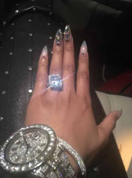 Nicki Minaj flashed her diamond ring and watch