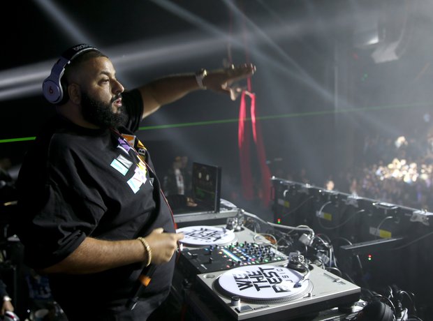 DJ Khaled on the decks at a Super Bowl party.