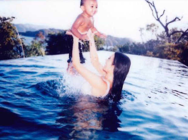Kim Kardashian with Saint in Costa Rica