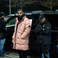 Image 10: Drake in a pink Stone Island coat