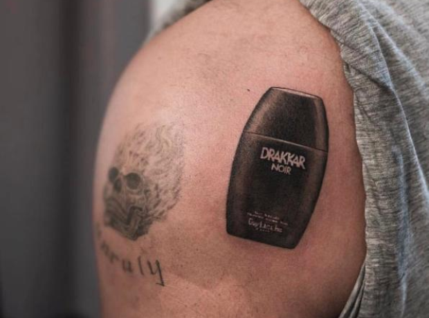 Drake Drakkar Noir tattoo