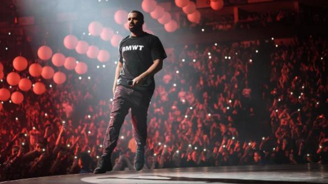Drake Kicks it at - Image 2 from The Buzz: Outkast Announces ATL Concert,  Drake Brings HAW To Astros Game and More