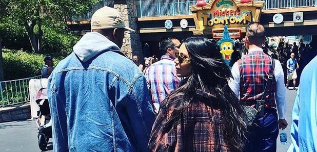 Kanye West and Kim Kardashian at Disneyland