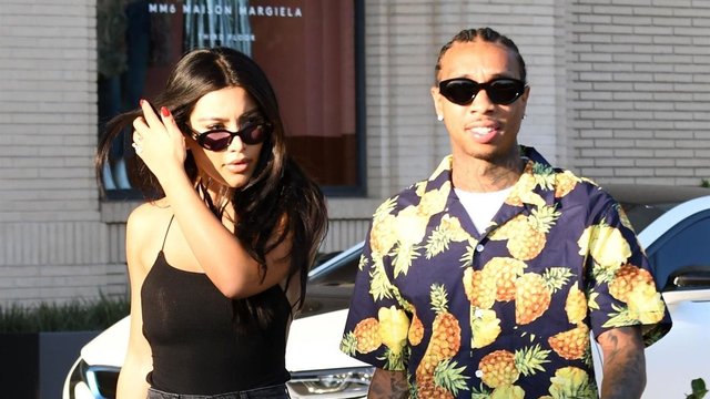 Tyga and a mystery brunette kim Kardasha lookalike