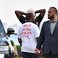 Image 9: Kanye West wears t-shirt with slogan