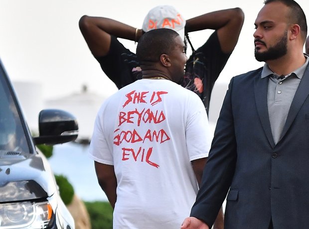 Kanye West wears t-shirt with slogan