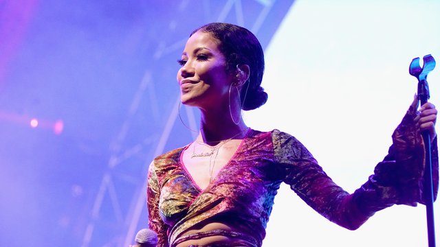 Jhene Aiko performs onstage