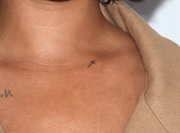 Rihanna cross tattoo