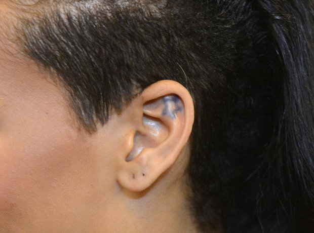 RIhanna ear tattoo
