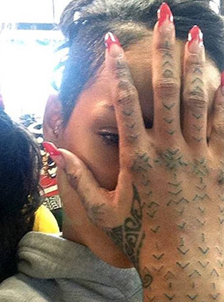 Rihanna hand tattoo