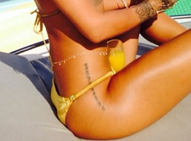21 Beautiful Rihanna Tattoos With Meaning (2023) - TattoosBoyGirl