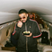 Image 8: Drake eating sushi on his private jet