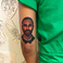 Image 2: Jhene Aiko got a tattoo of Big Sean on her arm