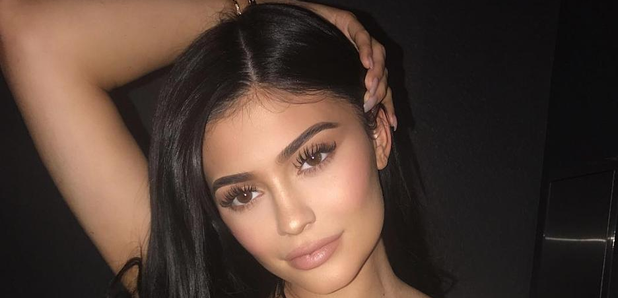 Kylie Jenner covers her stomach in family Calvin Klein underwear