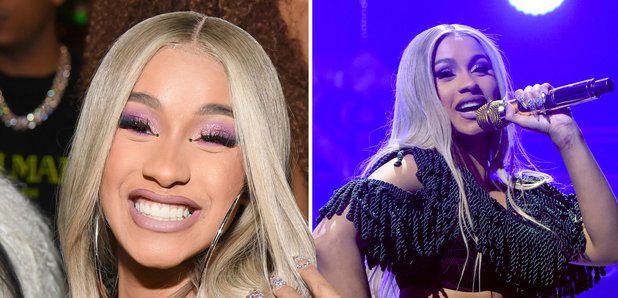 I Can't Tell Where Cardi B's Extra-Long Hair Begins and Her Cape Dress Ends  — See the Photos